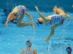 Австралийские спортсменки выступают с технической программой командных соревнований по синхронному плаванию на XXX летних Олимпийских играх в Лондоне.