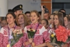 Российские гимнастки Алина Макаренко, Ульяна Донскова, Каролина Севастьянова (слева направо), завоевавшие золотые медали в групповых соревнованиях по художественной гимнастике на XXX летних Олимпийских играх в Лондоне, в аэропорту "Шереметьево".