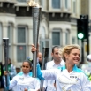 Посол Олимпийских игр-2014 топ-модель Наталья Водянова принимает участие в эстафете огня Паралимпийских игр 2012 года в Лондоне на одной из улиц города