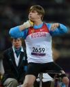 Россиянин Александр Ельмин во время толкания ядра на соревнованиях по легкой атлетике на ХIV летних Паралимпийских играх в Лондоне.