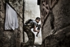  2-е место в категории «Горячие новости. Серия фотографий». Алеппо, Сирия, 10 октября 2012 года. Боец свободной армии Сирии занимает позиции во время столкновений с войсками правительства в районе Сулейман аль-Халаби.