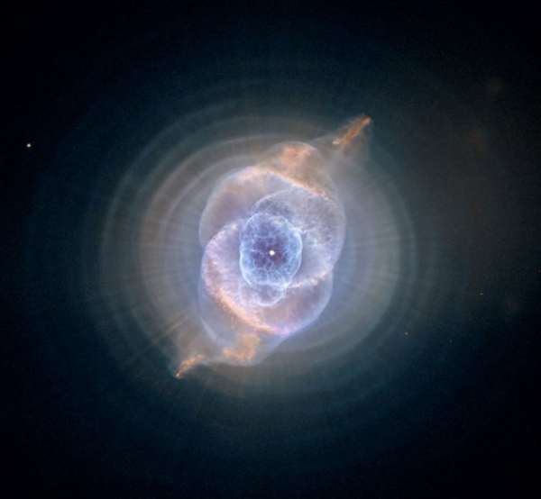 Туманность «Кошачий Глаз» или NGC 6543 — планетарная туманность в созвездии Дракона. Это одна из самых сложных по структуре туманностей. На снимках, сделанных с высоким разрешением телескопом Хаббла, видно множество сплетений, выбросов и ярких дугообразны