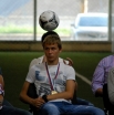 Алан Дзагоев подбрасывает мяч за спиной у своего одноклубника