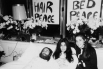 В конце марта 1969 года Джон Леннон и Йоко Оно начали публичный протест «В постели за мир», стремясь выразить своё несогласие с действиями американских военных во Вьетнаме. По окончании акции была записана песня «Дай миру шанс» («Give Peace a Chance»), ст