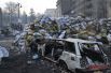 Во время столкновений на Грушевского пострадали не только милицейские машины, но и авто жителей Киева