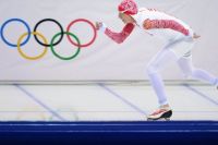 Иван Скобрев (Россия) на дистанции в забеге на 5000 метров в соревнованиях по конькобежному спорту среди мужчин на XXII зимних Олимпийских играх в Сочи.