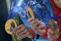 Медали российских спортсменов-биатлонистов. 