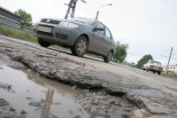 153 км дорог в Омской области отремонтируют в 2014 году.
