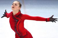 Юлия Липницкая в произвольной программе женского одиночного катания командных соревнований по фигурному катанию на XXII зимних Олимпийских играх в Сочи.