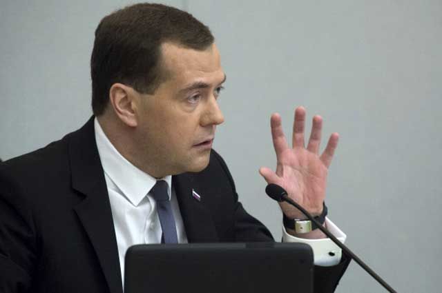 Дмитрий Медведев отвечает на вопросы парламентариев в Государственной Думе РФ после представления отчёта правительства РФ о результатах деятельности за 2013 год.