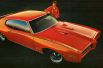 В 1969 году Pontiac разработал новую версию GTO – The Judge. Машина получила более мощный двигатель и задний спойлер, подчёркивавший агрессивный характер автомобиля.