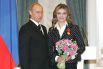 Награждение Президентом РФ В. Путиным орденом «За заслуги перед Отечеством» IV степени, 21 декабря 2005 года. В 2007 году Алина Кабаева становится депутатом Государственной Думы.
