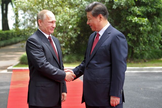 Президент России Владимир Путин и председатель Китайской народной республики Си Цзиньпин. 