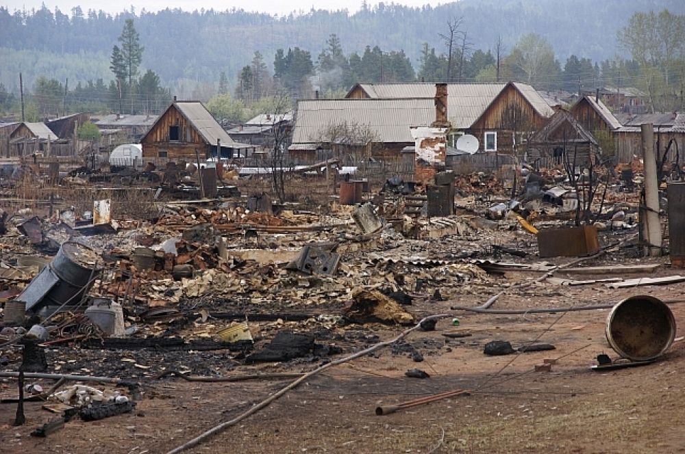 59 жителей поселка Дальний остались без крова в результате мощного лесного пожара в мае 2014 года.