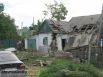 Разрушенные дома в Амвросиевке после обстрела