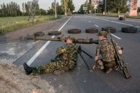 Бойцы батальона народного ополчения «Восток» во время боя за аэропорт в Донецке.