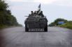 Украинские военные на БТРе