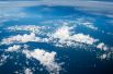 Энтузиастом коммерческой аэрофотосъёмки является Шерман Фэйрчайлд, чья компания занималась производством самолётом для высокогорной местности. На фото: облака над Кубой.