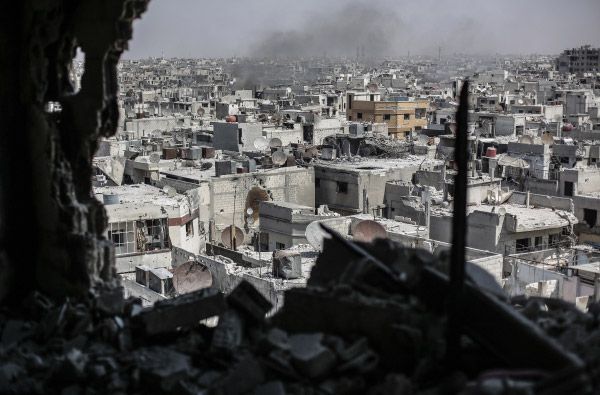 Разрушенные дома в Сирии.