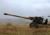 Украинские военные учатся стрелять из гаубиц