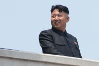 Первый секретарь Центрального комитета Трудовой партии Кореи Ким Чен Ын во время военного парада в Пхеньяне, 2013 г.