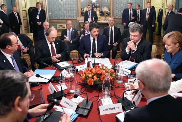 Владимир Путин на встрече с Ангелой Меркель, Франсуа Олландом и Петром Порошенко в Милане.