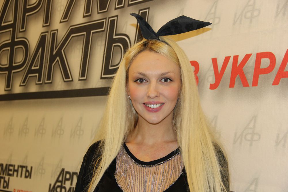 Оля Полякова