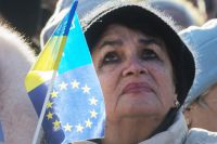 Участница акции сторонников евроинтеграции Украины на площади Независимости в Киеве.