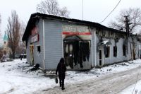 Станция технического обслуживания автомобилей, сгоревшая в результате обстрела украинскими силовиками
