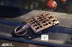 Ажурная орнаментированная пряжка из женского поясного набора Самбийского типа II века. Повторяет форму поясных пряжек Римской империи. Найдена на территории Зеленоградского района.