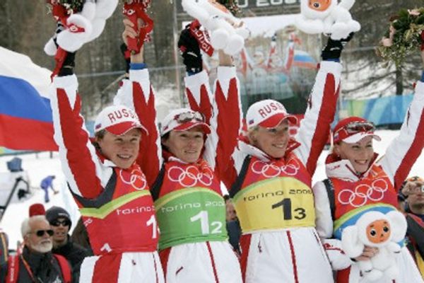 Ольга Зайцева — Олимпийская чемпионка в эстафете, 23 февраля 2006 года, Турин.