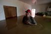 24 февраля. Житель города Акре в своем затопленном доме. Около 850 семей были эвакуированы после того, как река Акре стала выходить из берегов после трех дней ливневых дождей. 
