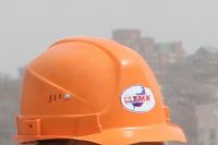Логотип «ТМК» на строительной каске.