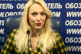 Оля Полякова