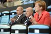 2014 год. Президент России Владимир Путин, президент Международной федерации футбола (ФИФА) Йозеф Блаттер и канцлер Германии Ангела Меркель.