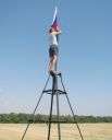 Традицией стало водружать на геодезическом знаке, установленном на вершине холма, флаг России.