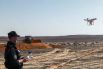 Сотрудник МЧС России запускает беспилотный летательный аппарат на месте крушения российского самолета Airbus A321 авиакомпании «Когалымавиа».