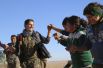 Около трети бойцов ополчения сирийских курдов – молодые женщины и девушки. 