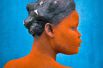 Женщина из демократической республики Конго, впервые ставшая матерью. В ходе специального ритуала их тело и волосы покрывают специальными красками. Патрик Уиллок (Франция).