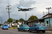Президентский самолёт, пролетающий над окраиной Гаваны.