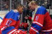 Президент России Владимир Путин и министр обороны РФ Сергей Шойгу в гала-матче турнира Ночной хоккейной лиги.