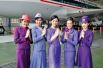 Форма стюардесс Тайских авиалиний стилизована под традиционные платья. 