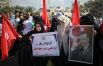 Палестинцы принимают участие в митинге в поддержку правительства президента Турции Эрдогана.