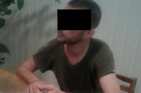 Мужчина в отделении полиции