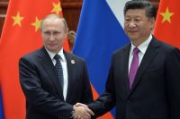 Президент РФ Владимир Путин и председатель КНР Си Цзиньпин во время встречи в Ханчжоу.