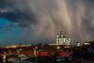 Работа «Буря над городом» лауреата фотоконкурса Евгения Гаврилова.