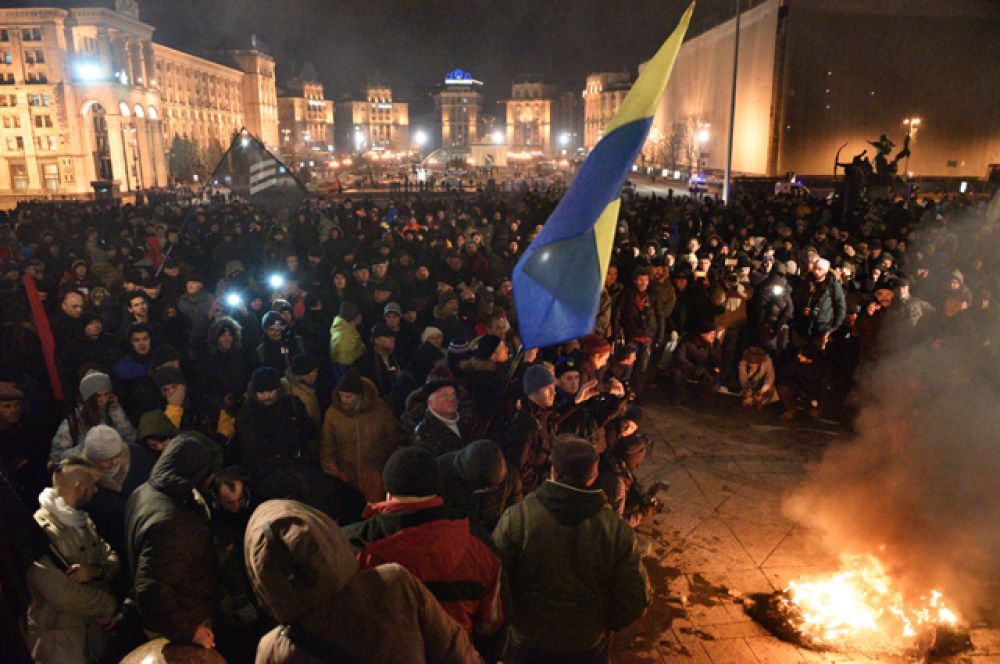 Участники акции в Киеве, посвященной годовщине начала событий на Майдане.