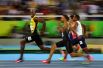 Категория «Спорт», третье место в номинации «Отдельная фотография». Ямайский бегун Усэйн Болт улыбается фотографу во время 100-метрового полуфинального спринта на Олимпийских играх 2016 года в Рио-де-Жанейро, Бразилия.