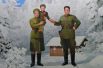 Пропагандистский портрет Ким Чен Ира с родителями.