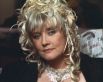 В середине 90-х годов она появилась в главной роли эксцентричной комедии супруга «Ширли-мырли», 1995 год.